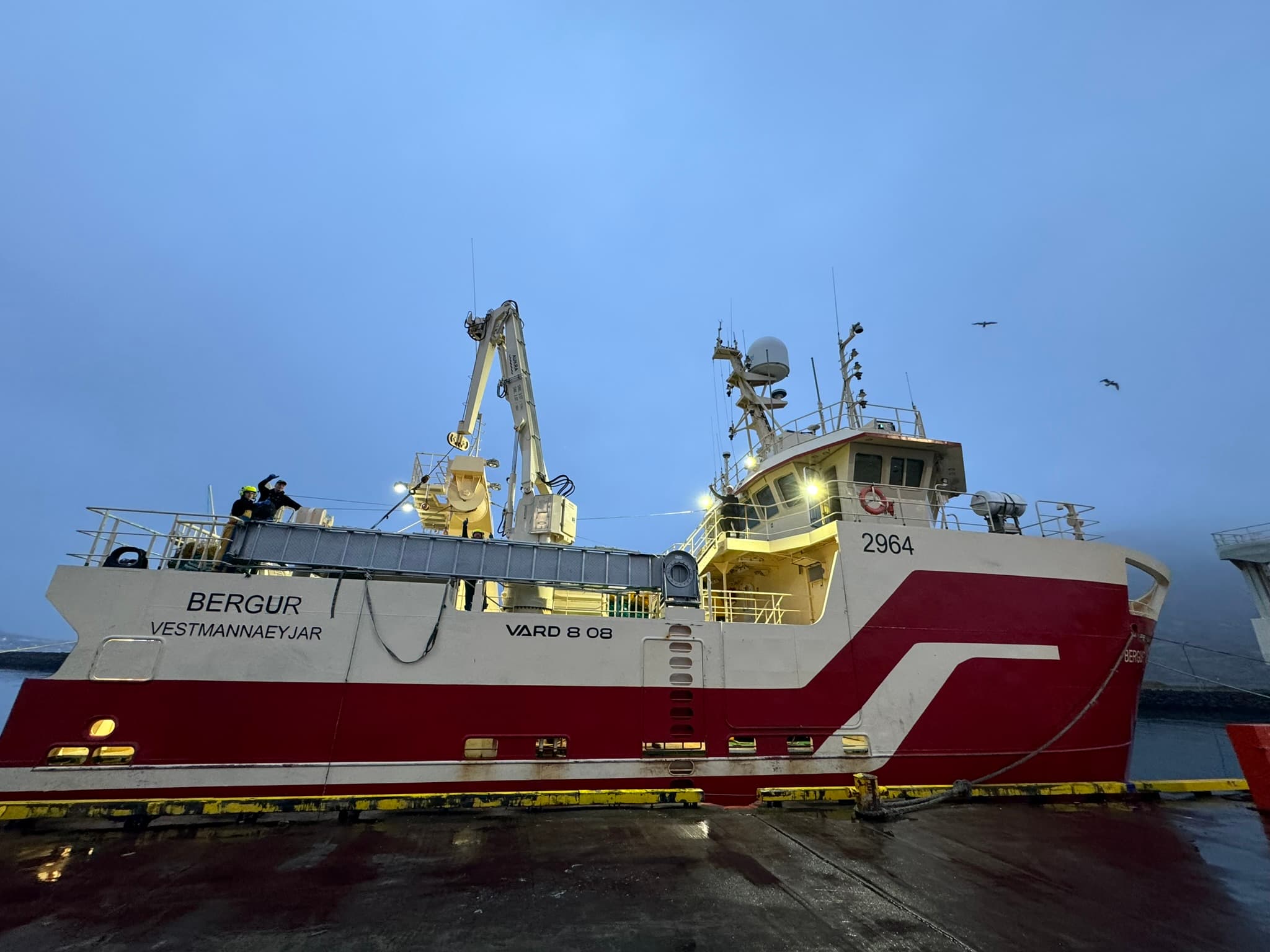 The crew on board Bergur at Bergur-Huginn join Alda